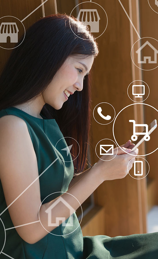 Woman using phone to explore digital retail experience